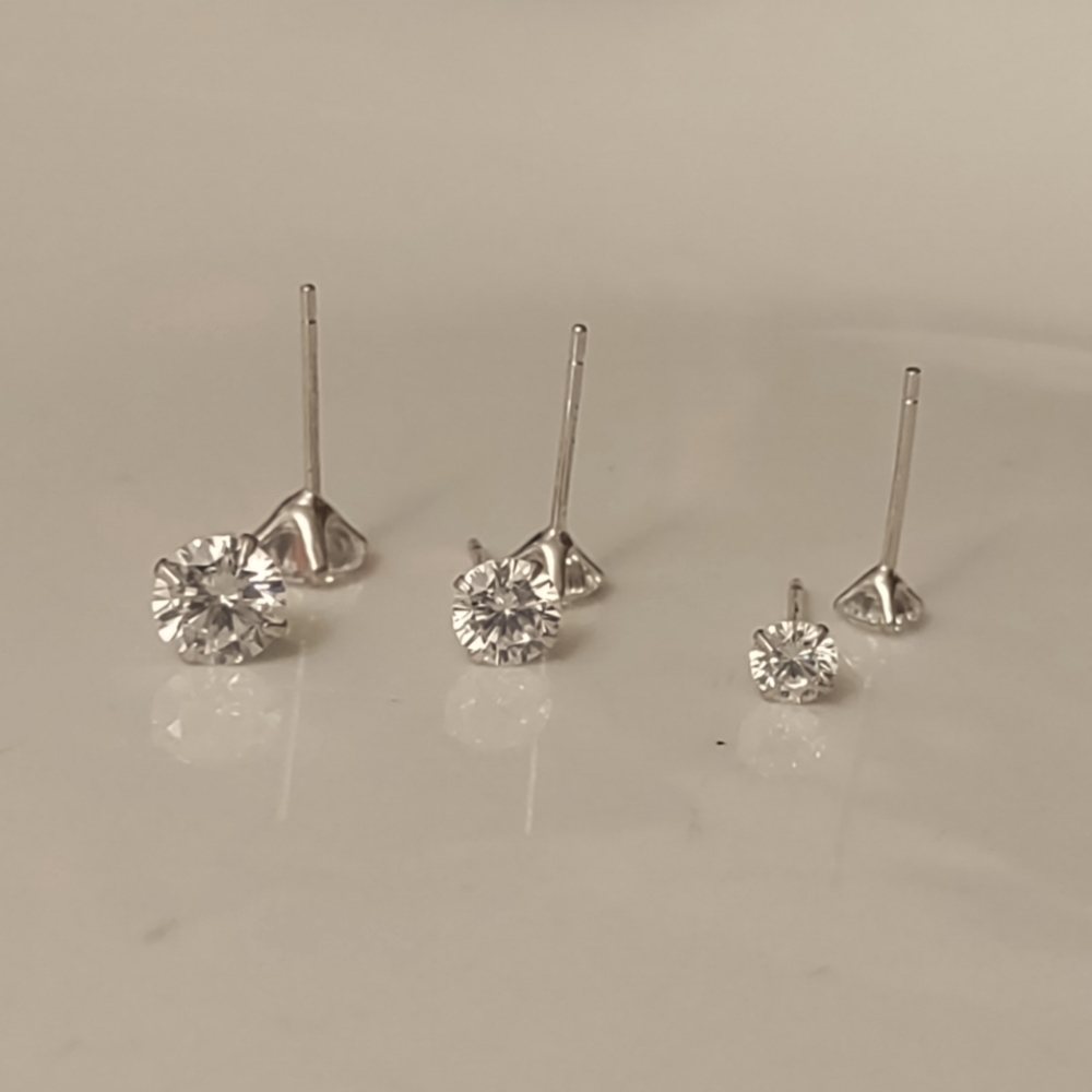 - Diamond stud earrings three-piece set 90, 70 and 40 9-25 Sterling